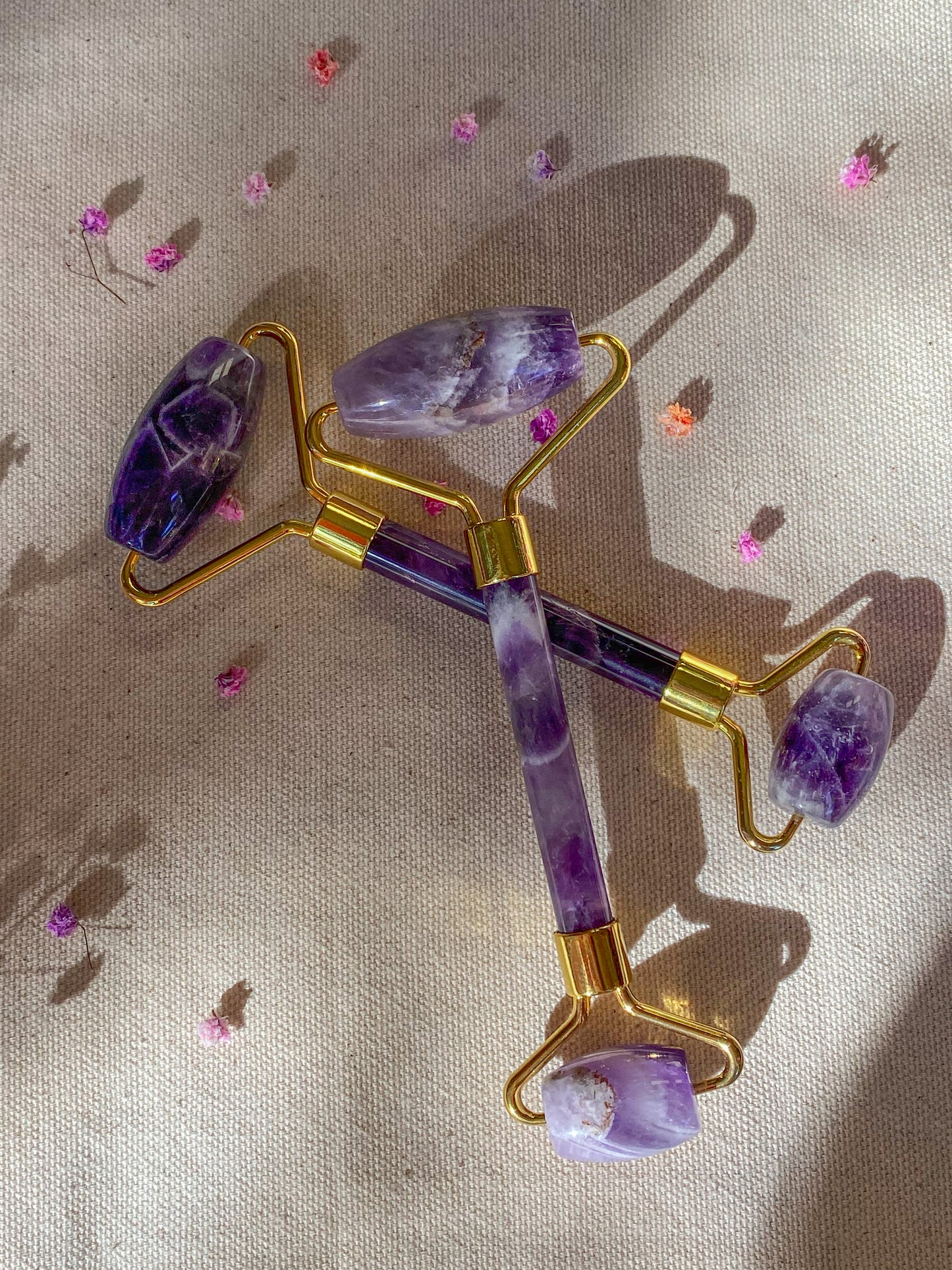 Veido masažuojamasis volelis su ametisto kristalu