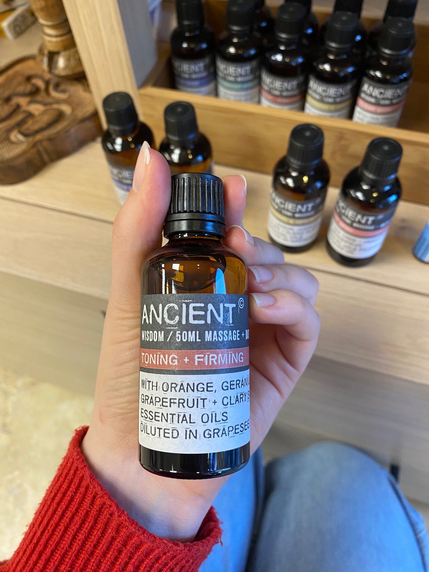 Tonizuojantis ir stangrinamasis masažinis aliejus