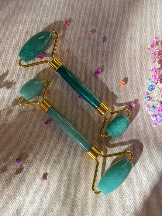 Veido masažuojamasis volelis su nefrito kristalu
